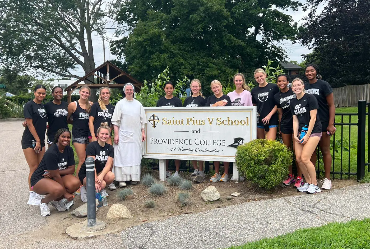 standing in front of st pius 